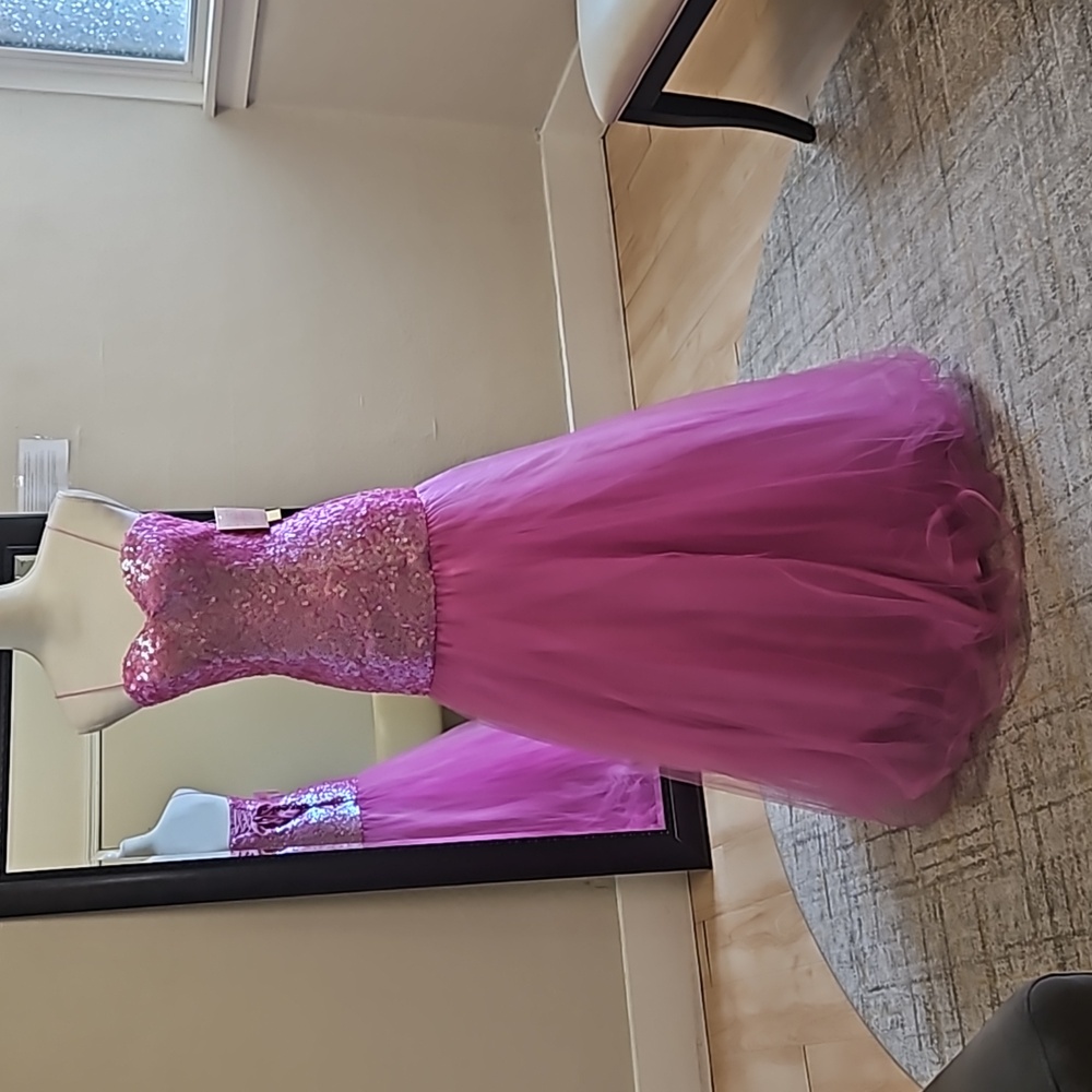 Size 4 fuchsia sequin fit and flare lace up back w/ tulle skirt by Blush Prom